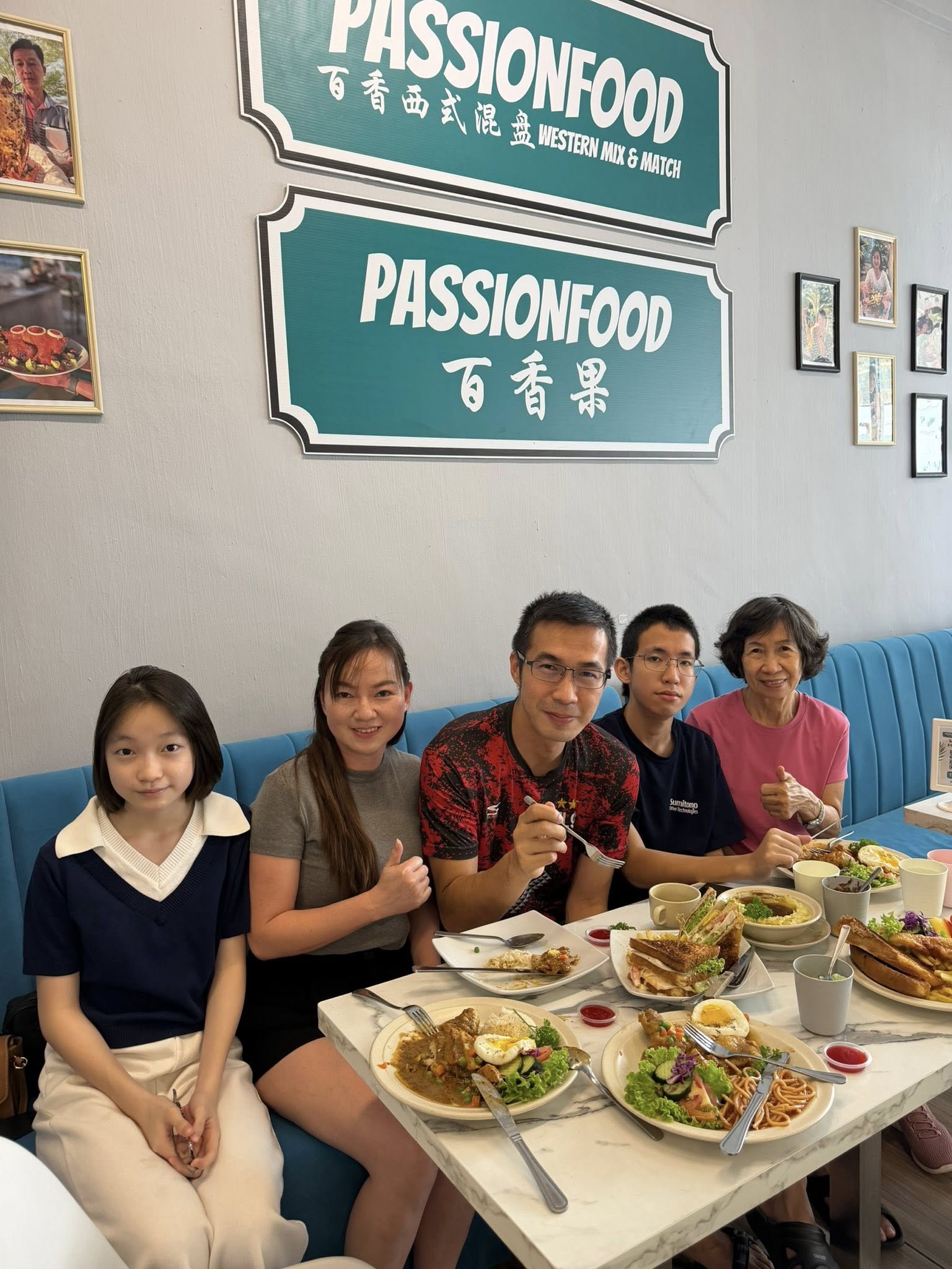 Family enjoying meal at PassionFood